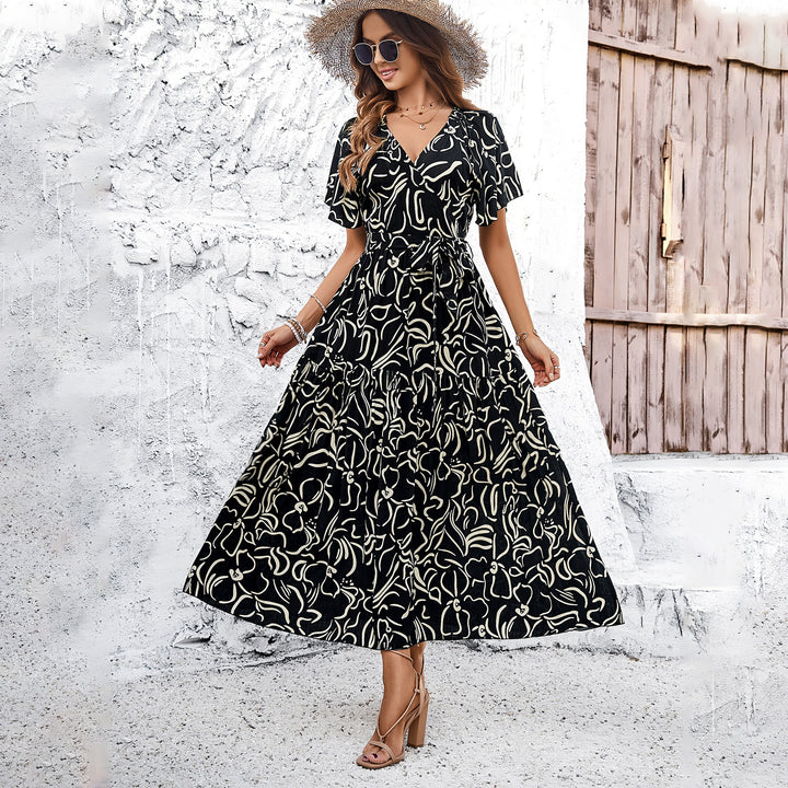 Damen Wickelkleid mit voluminösen Ärmeln und verspieltem Muster Drune