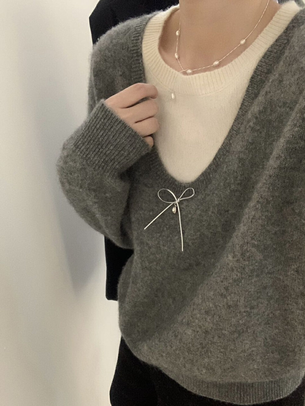 Damen Pullover mit elegantem V-Ausschnitt und edler Schleifenapplikation Drune