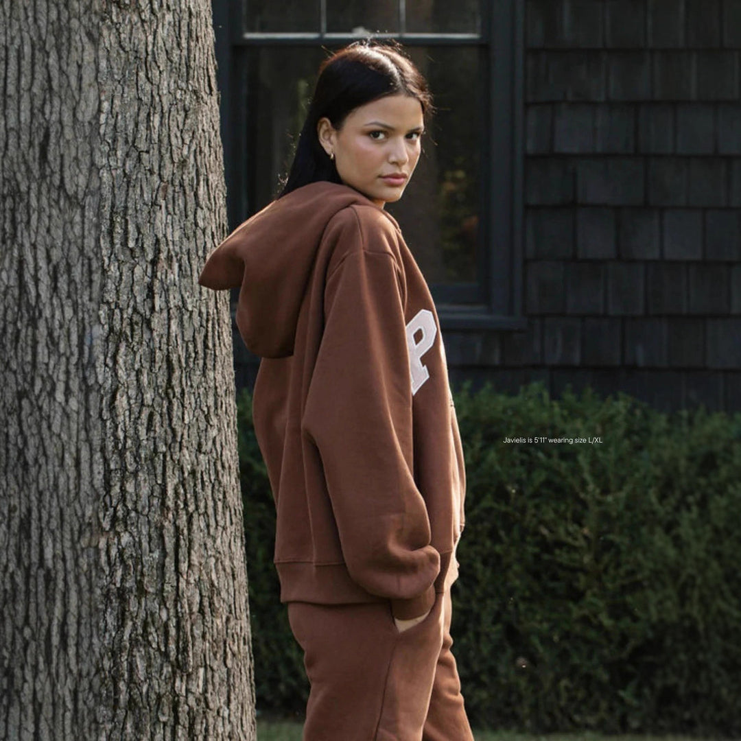 Damen Kapuzenjacke mit auffälligem Schriftzug und weichem Innenfutter Drune