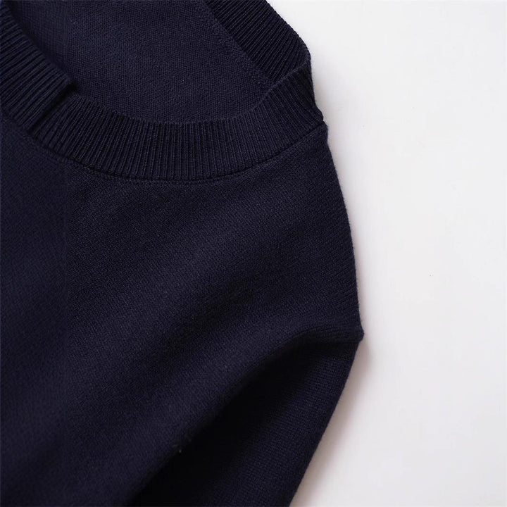 Damen Strickjacke mit verspieltem Rüschensaum und Knopfdetails Drune