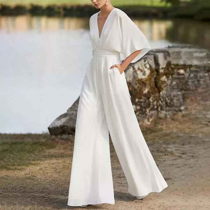 Damen Jumpsuit mit tiefem V-Ausschnitt und weit geschnittenen Beinen Drune