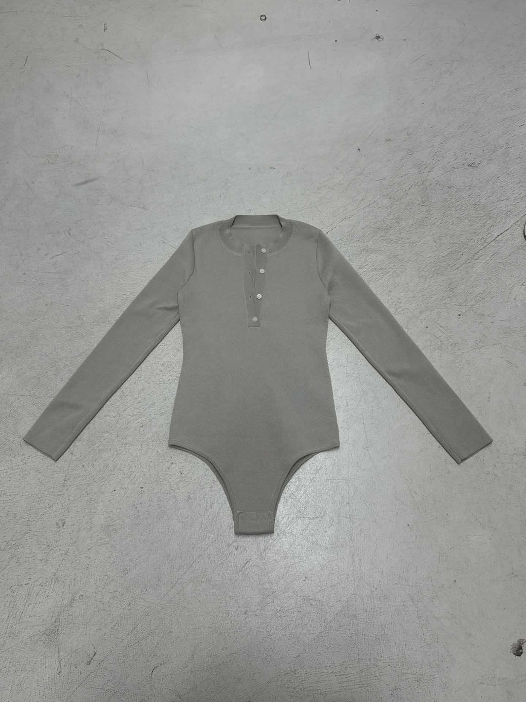 Damen Langarm-Bodysuit mit Knopfleiste und Rippstruktur Drune