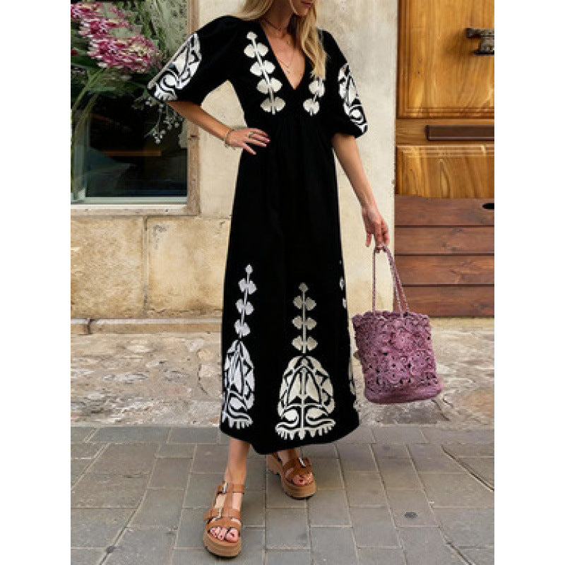 Damen Midikleid mit luftigen Puffärmeln und floralem Stickdesign Drune