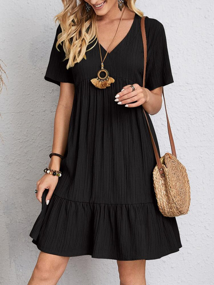 Damen V-Ausschnitt Sommerkleid mit voluminösem Saum Drune