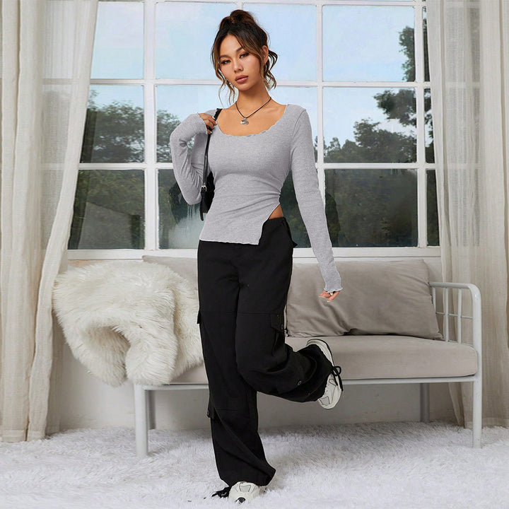 Damen figurbetontes Langarmshirt mit asymmetrischem Saum und elegantem Ausschnitt Drune