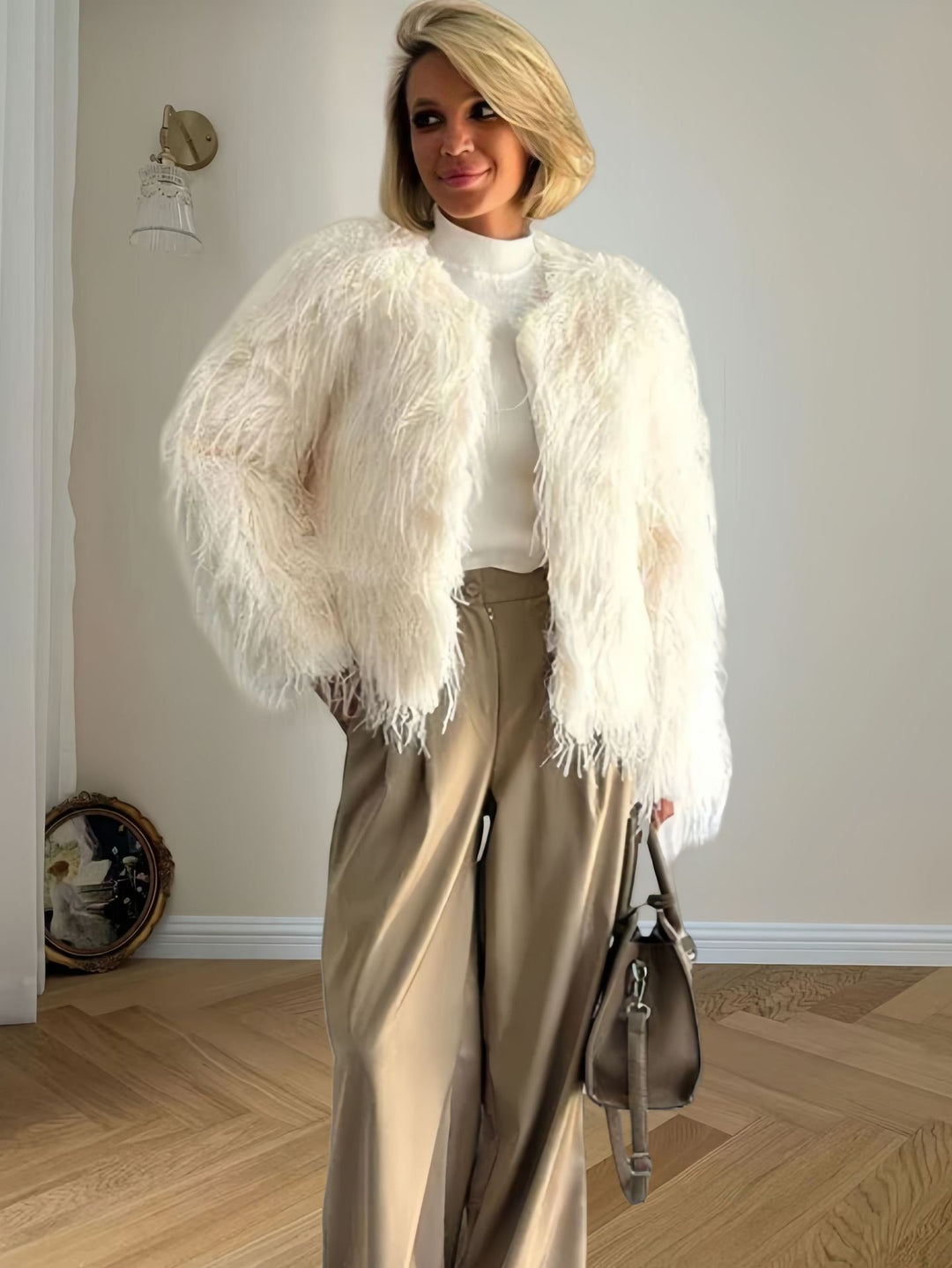 Damen Modische Kunstpelzjacke mit voluminösen Ärmeln Drune