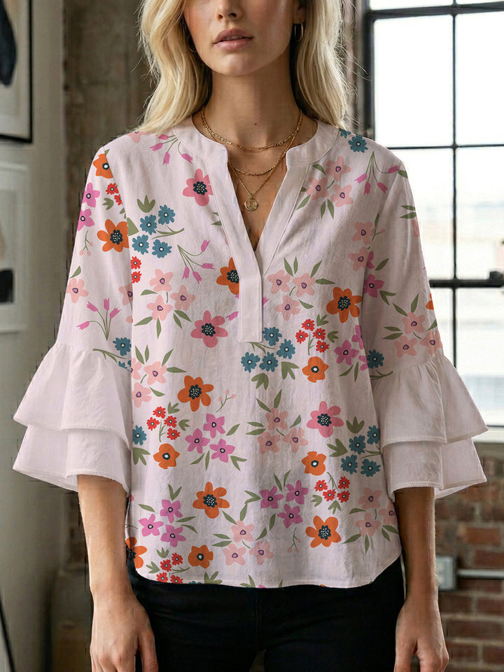 Damen Bluse mit voluminösen Flügelärmel und intensivem Blattmuster Drune