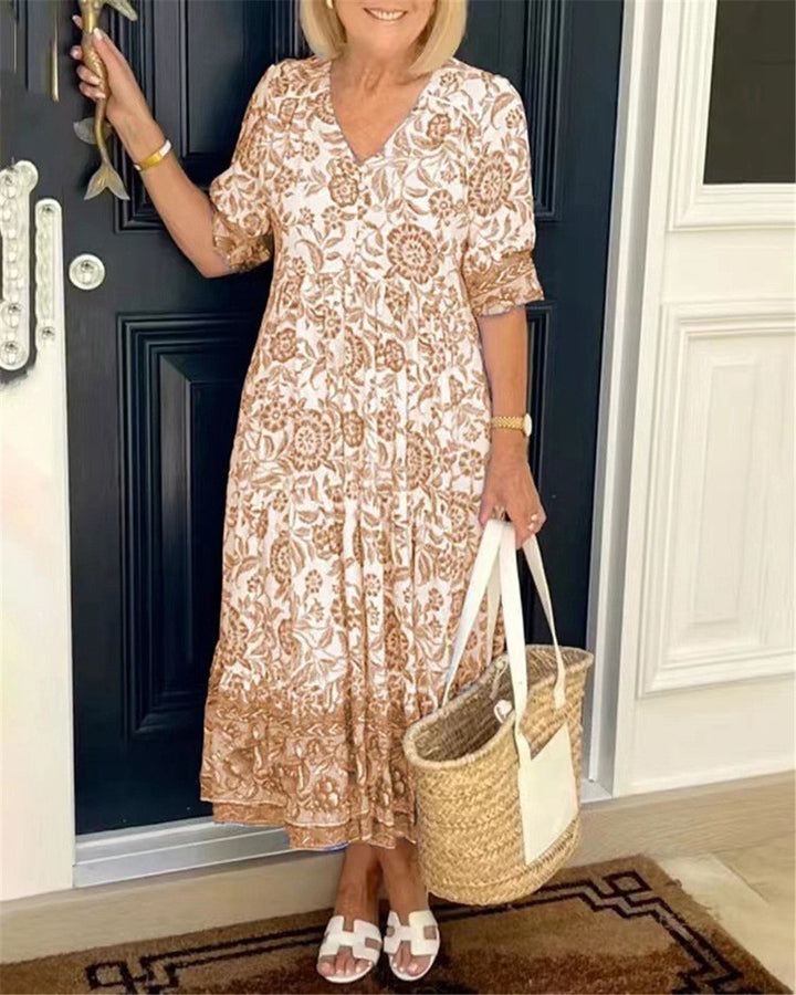 Damen Maxi-Kleid mit floralen Mustern und Volant Drune