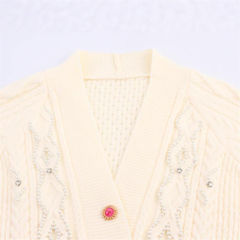 Damen Strickjacke mit detaillierter Zopfmusterung und eleganten Rüschendetails Drune
