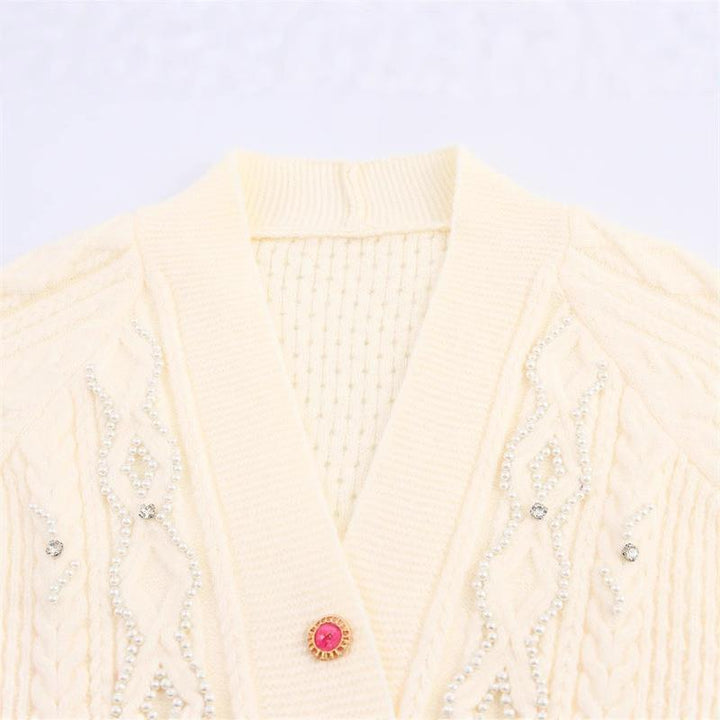 Damen Strickjacke mit detaillierter Zopfmusterung und eleganten Rüschendetails Drune