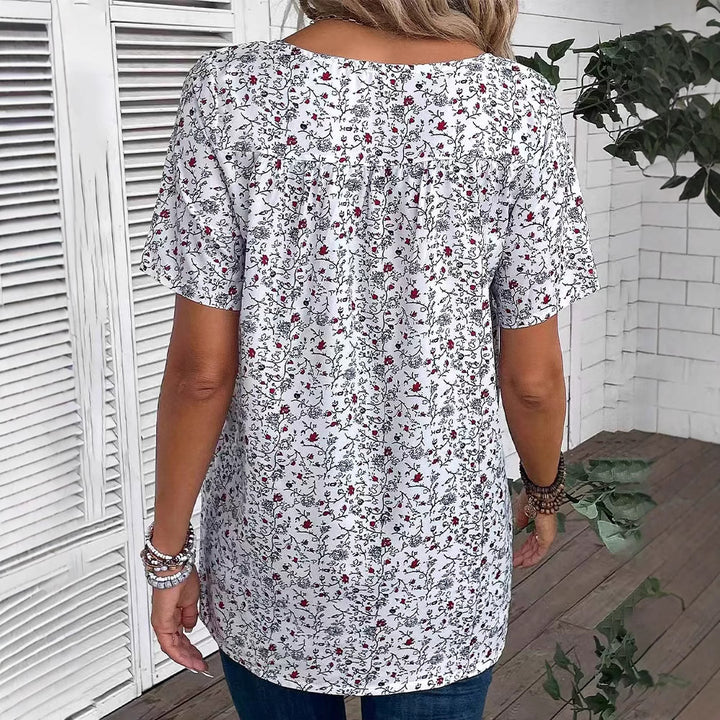 Damen nan lässiges Kurzarm-Tunika-Shirt mit Rundhalsausschnitt, zartem Blumenallover und dekorativen Brustfalten Drune