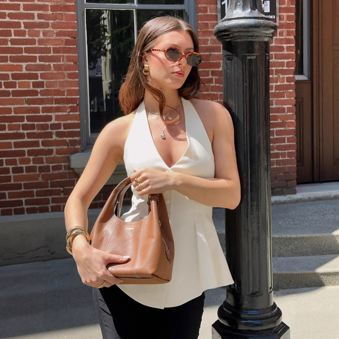 Damen Halterneck-Bluse mit taillierter Passform und Knopfleiste Drune