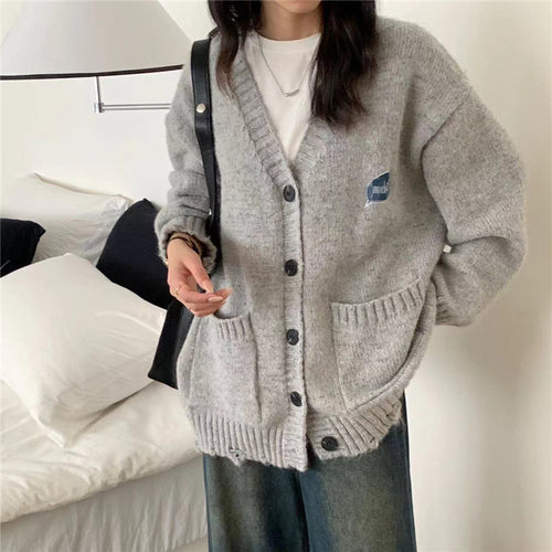 Damen Grober Strickcardigan mit praktischen Taschen und Knopfdetails Drune