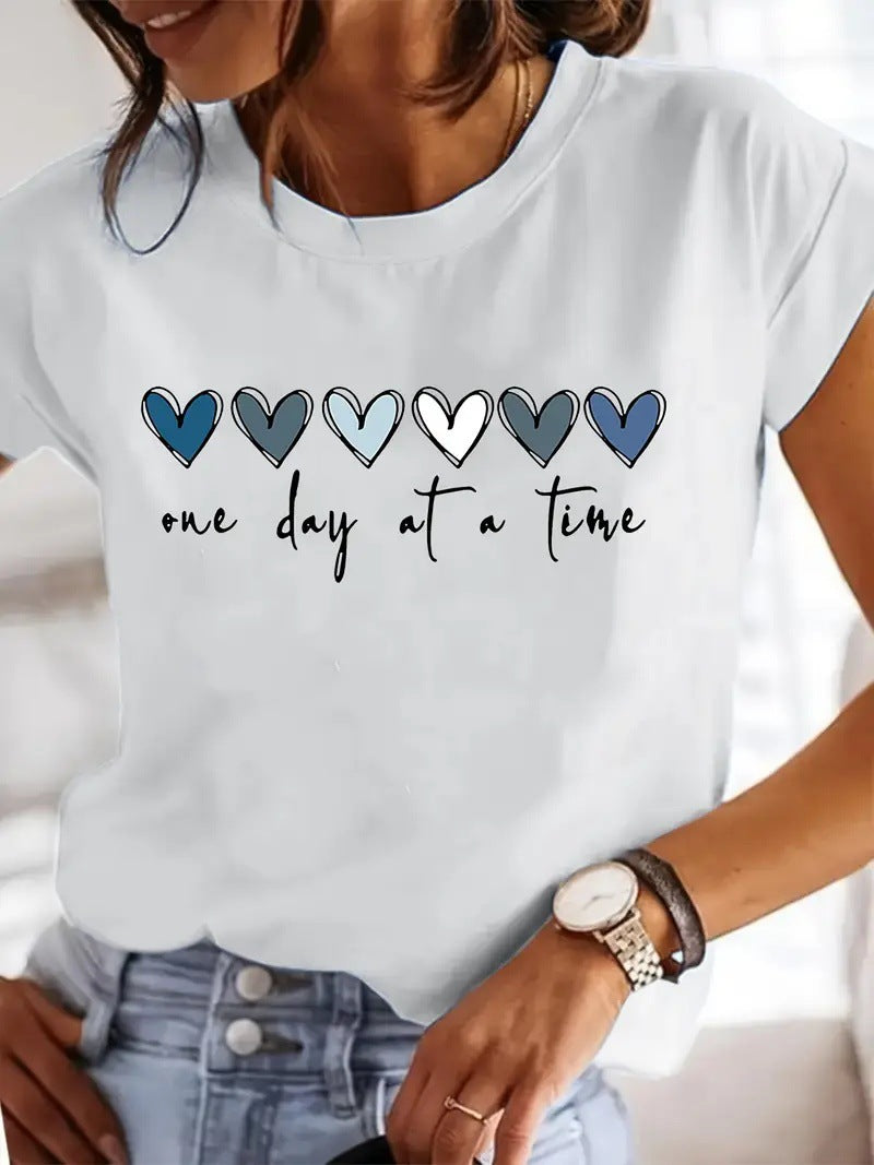 Damen Casual Grafik T-Shirt mit Herzdesign und inspirierendem Zitat Drune