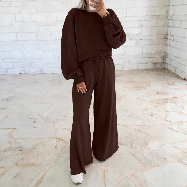 Damen gemütliches Sport-Set mit lässigem cropped Sweatshirt und weitem Hosen Schnitt Drune