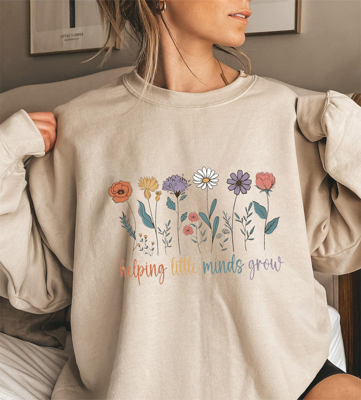 Damen Sweatshirt mit voluminösen Ärmeln und motivierendem Blumenaufdruck Drune