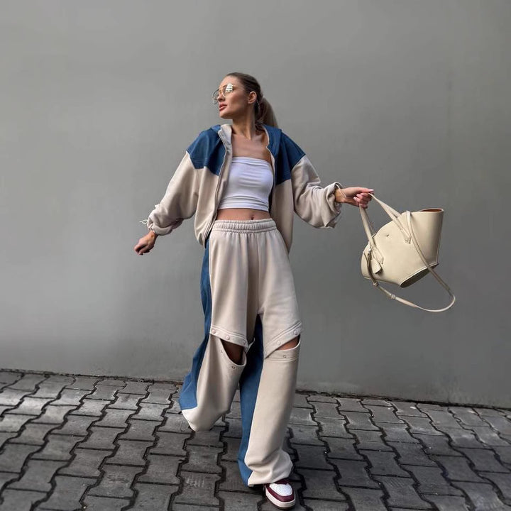 Damen modisches Freizeit-Outfit mit sportlicher Jacke und kreativen Cut-Out-Hosen Drune