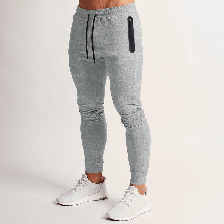 Herren sportliche Fitness-Hose mit atmungsaktiven Einsätzen und praktischen Reißverschlusstaschen Drune