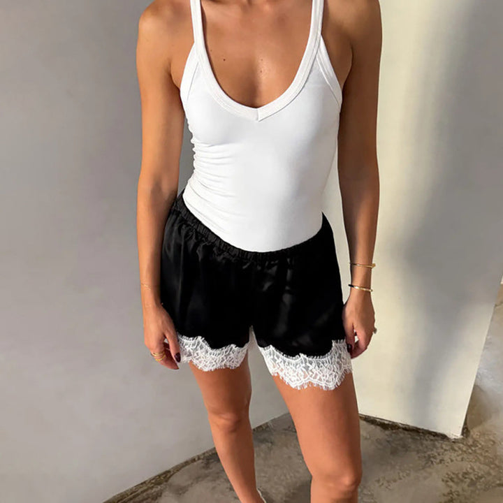 Damen Sport-Bodysuit mit elastischen Shorts und Spitzenbesatz Drune
