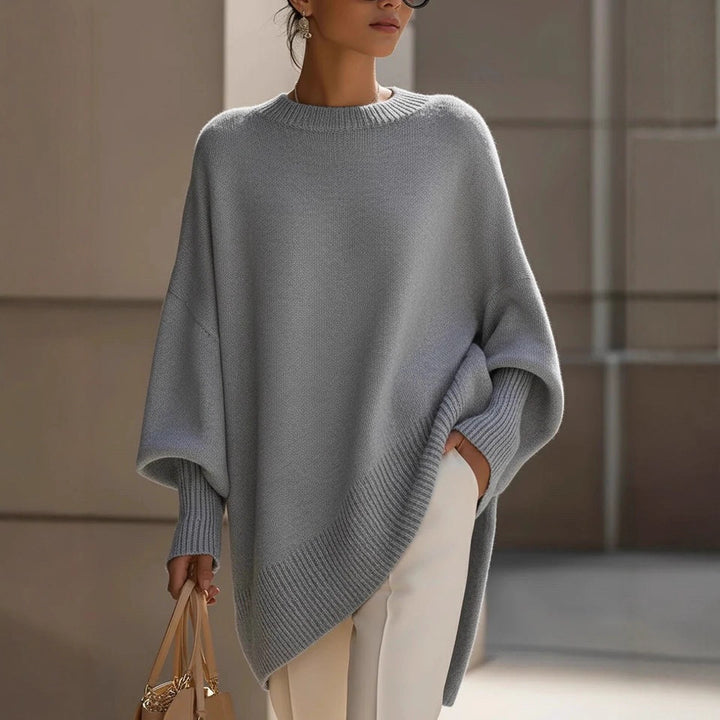 Damen nan Oversize Strickponcho mit asymmetrischem Saum und gerippten Ärmeln Drune