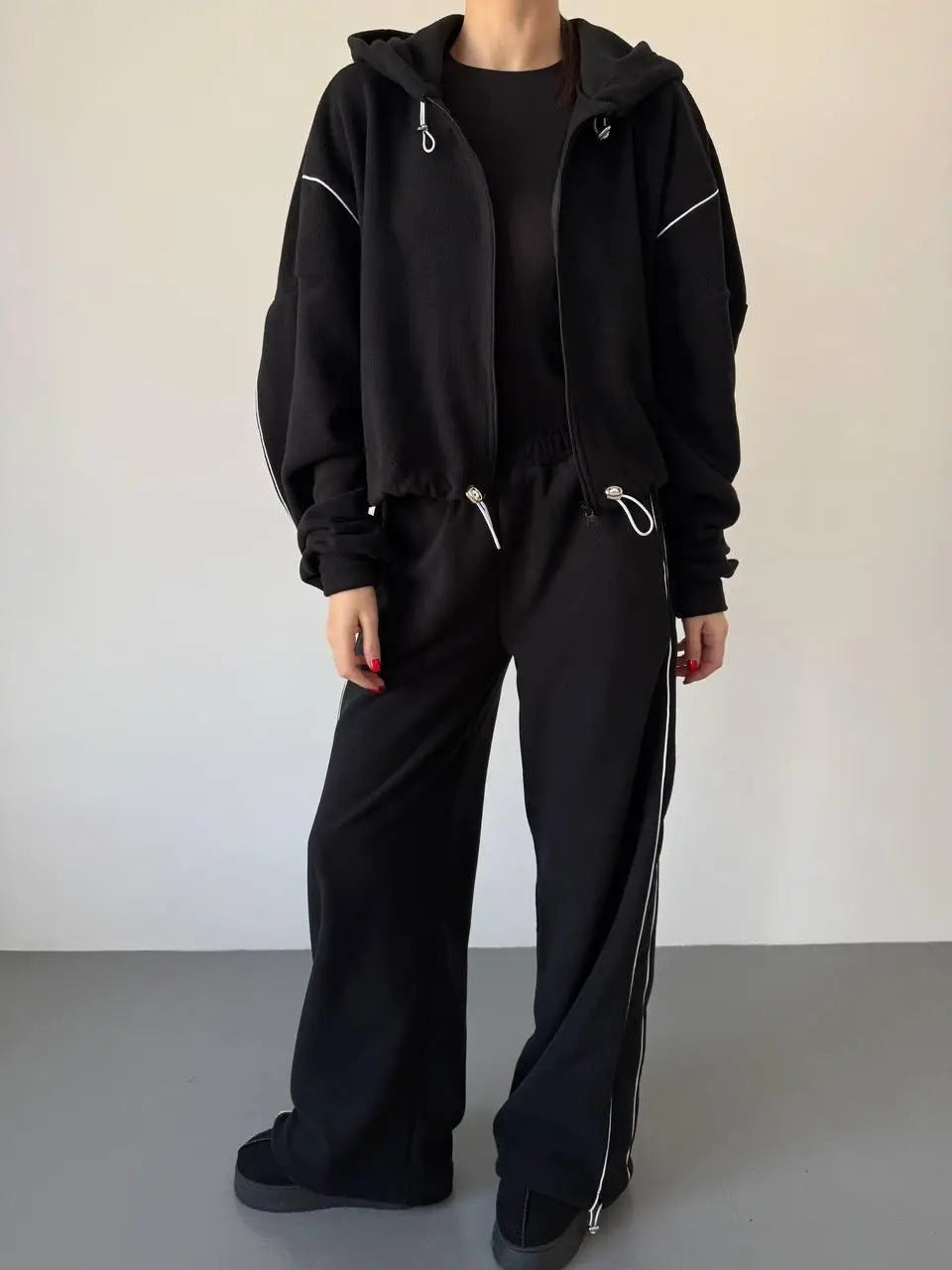 Damen lässiger Kapuzen-Sweatanzug mit weiten Hosen und seitlichem Streifen Drune