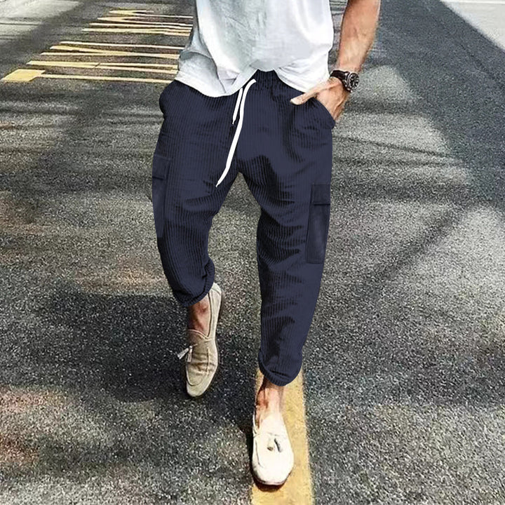 Herren nan Cord-Cargo-Jogginghose mit elastischem Tunnelzugbund, aufgesetzten Klappentaschen und tapered Bein Drune