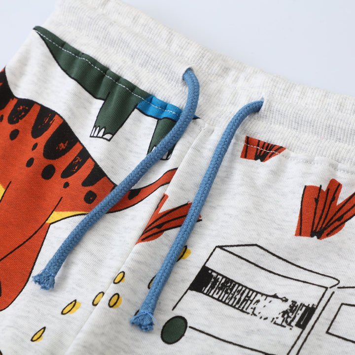 Jungen Jogginghose mit buntem Dinosaurier- und Fahrzeug-Design Drune