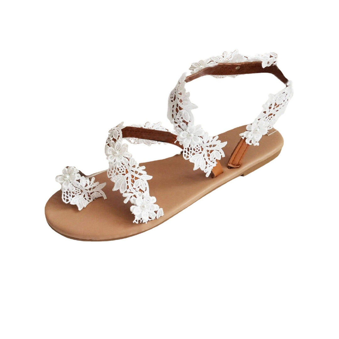 Damen Elegante und zarte Riemchen-Sandalen mit floralen Details Drune