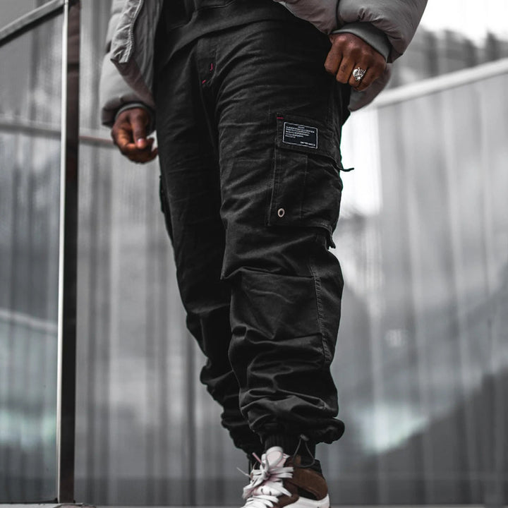 Herren nan urbaner Utility-Jogger mit geknöpften Cargotaschen und verstellbarem Knöchelzug Drune