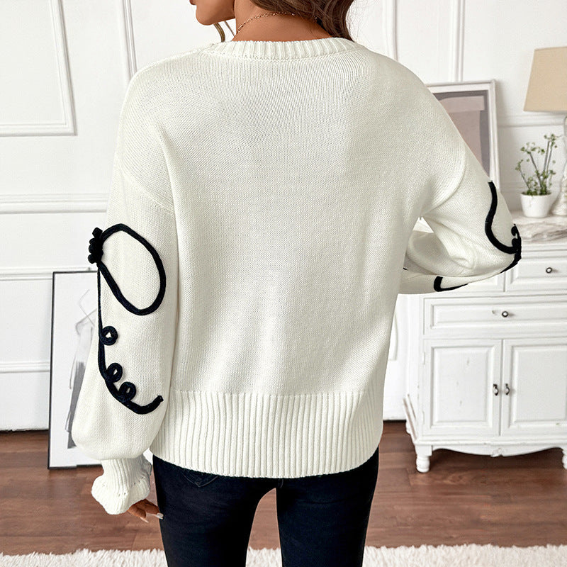 Damen Strickpullover mit floralen Applikationen und hohem Kragen Drune