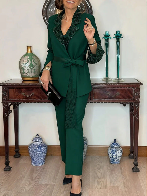 Damen Eleganter Gürtelanzug mit schimmerndem Revers Drune