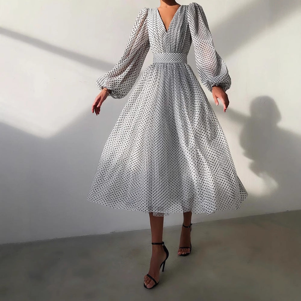 Damen Kleid mit transparentem Puffärmel und floralem Punkte-Design Drune