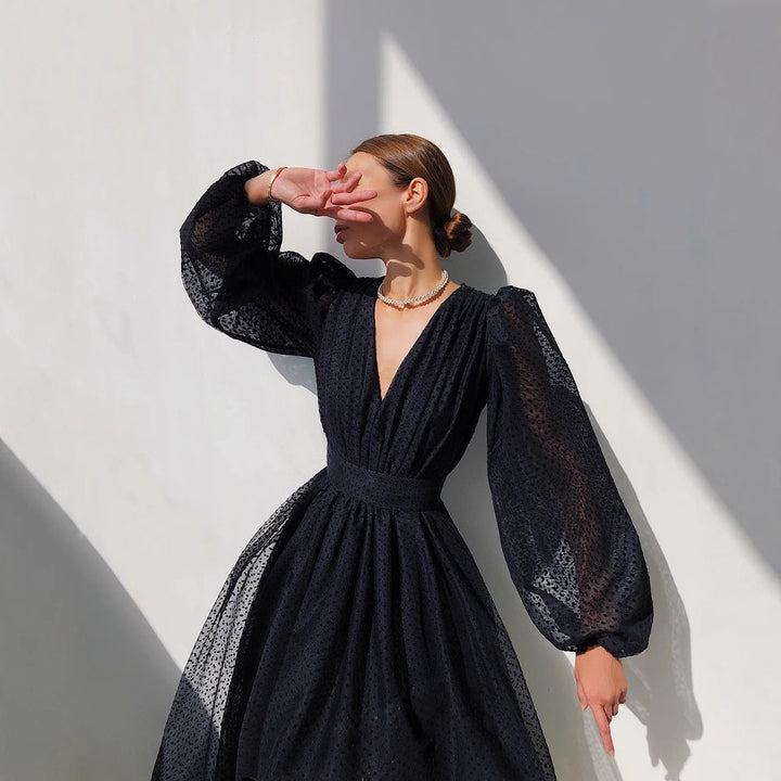 Damen Kleid mit transparentem Puffärmel und floralem Punkte-Design Drune