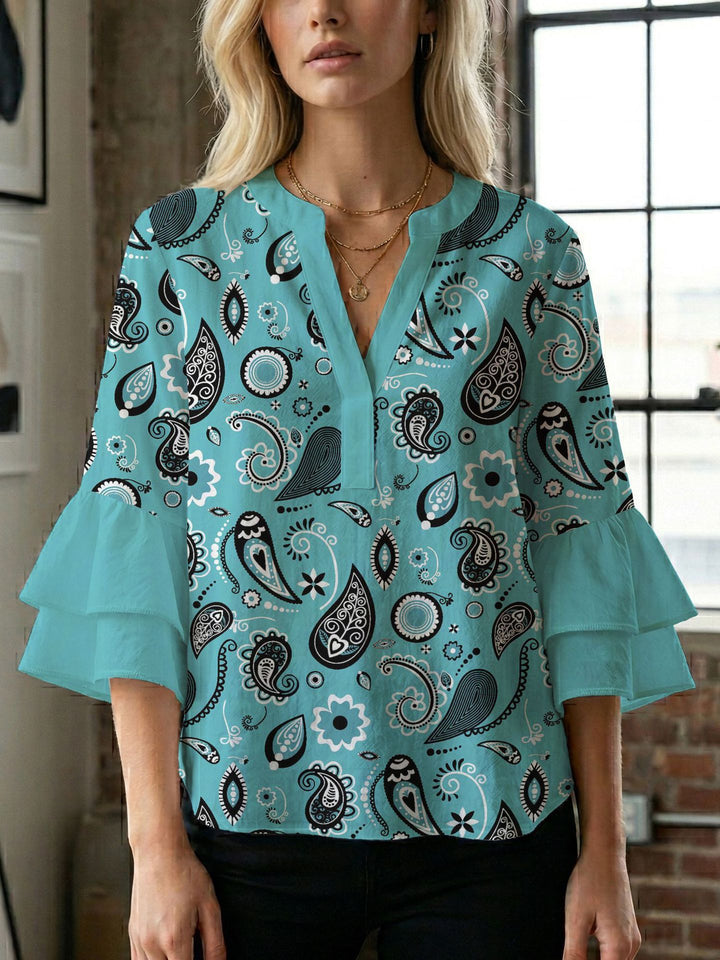 Damen Bluse mit voluminösen Flügelärmel und intensivem Blattmuster Drune