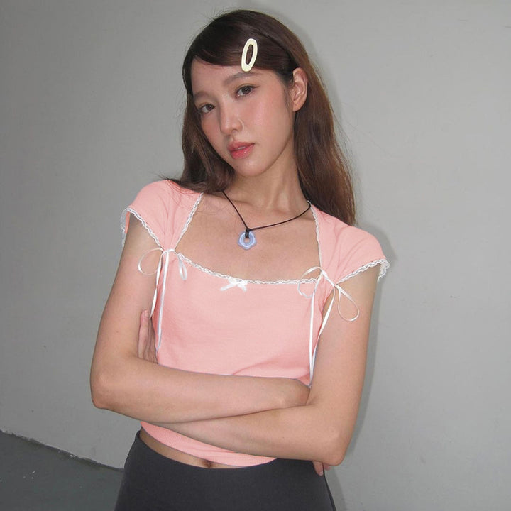 Damen Crop-Oberteil mit verstellbaren Spaghettiträgern und eleganten Knoten-Details Drune