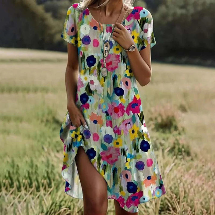 Damen Sommerkleid mit floralem Detail und asymmetrischem Saum Drune
