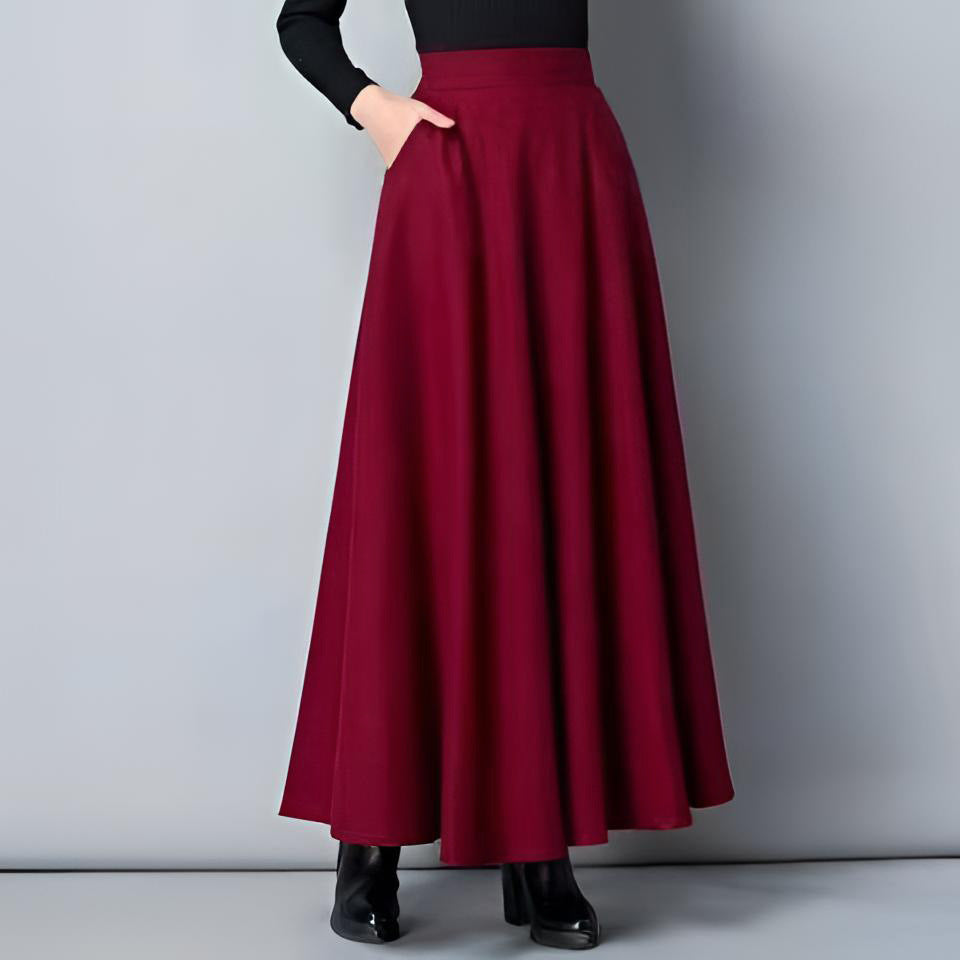 Damen Eleganter Maxirock mit schwingendem Saum und praktischen Taschen Drune