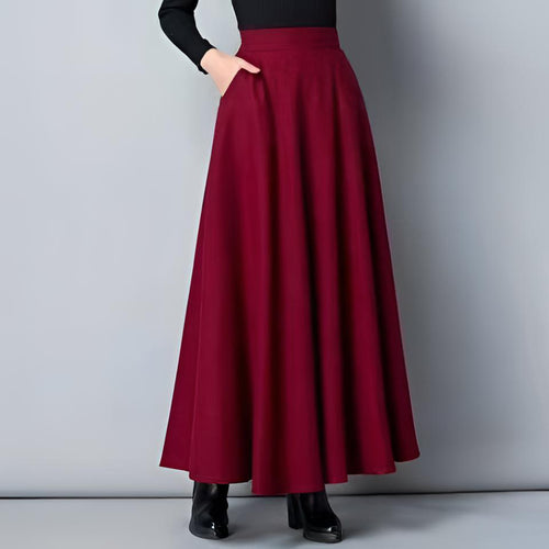 Damen Eleganter Maxirock mit schwingendem Saum und praktischen Taschen Drune