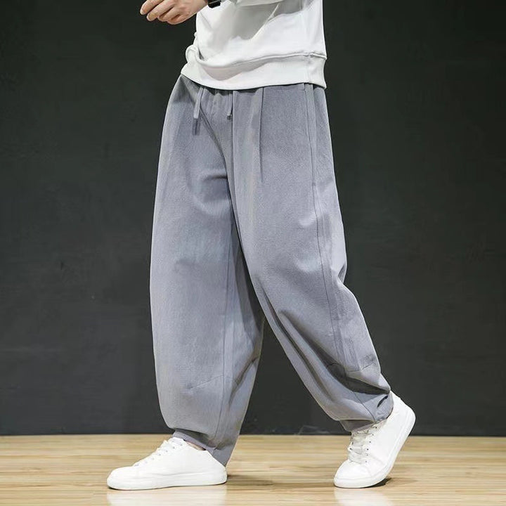 Herren nan oversized Relax-Fit Baumwoll-Jogpants mit tiefem Schritt, Tunnelzug und seitlichen Eingrifftaschen Drune