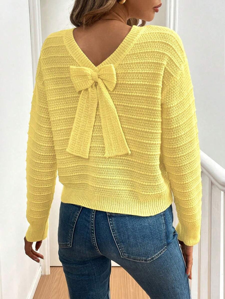 Damen Strickpullover mit verspieltem Schleifendetail im Rücken und modernem V-Ausschnitt Drune