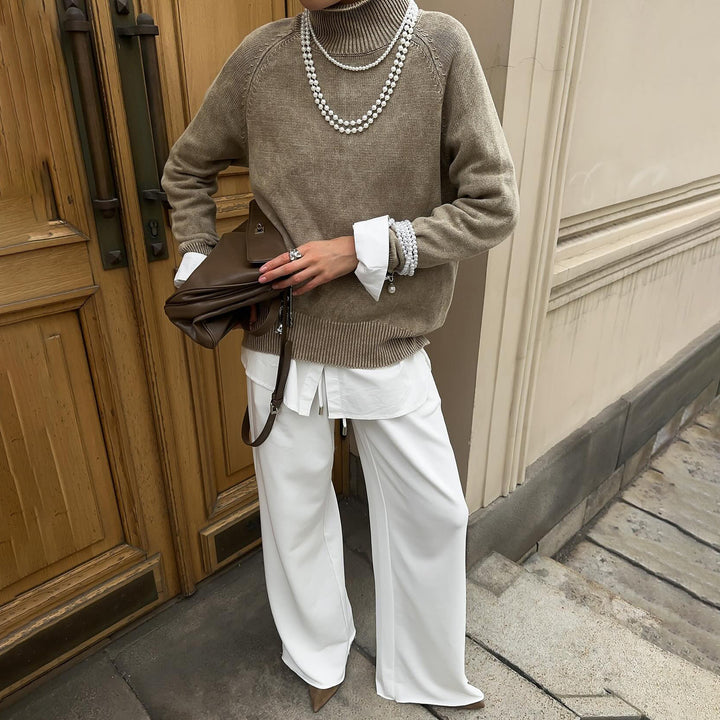 Damen gemütlicher Strickpullover mit hohem Kragen und stylischen Ärmelaufschlägen Drune