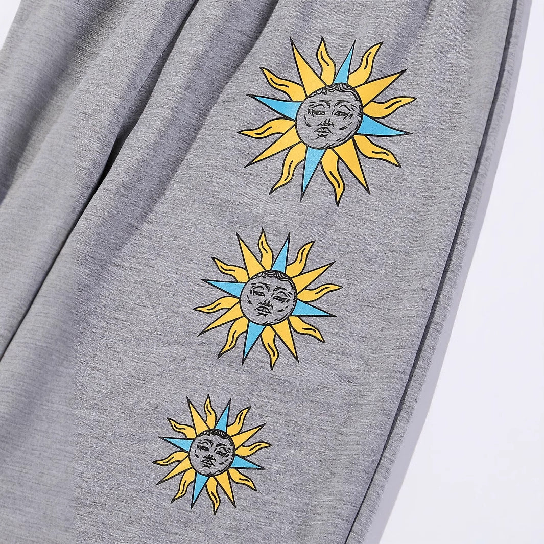 Damen bequeme Sweatpants mit trendigem Sonnenmotiv Drune