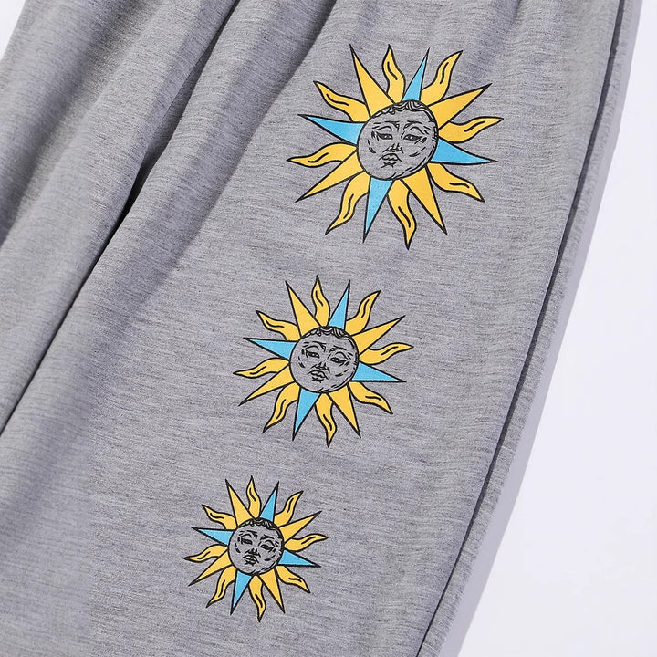 Damen bequeme Sweatpants mit trendigem Sonnenmotiv Drune