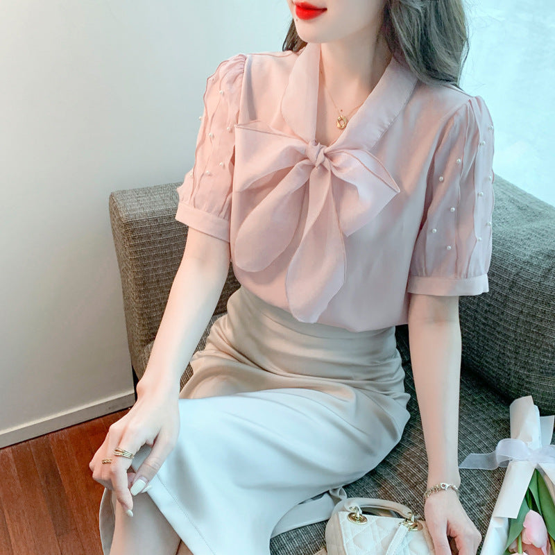 Damen Bluse mit elegantem Schleifen-Ausschnitt und strukturierten Ärmeln Drune