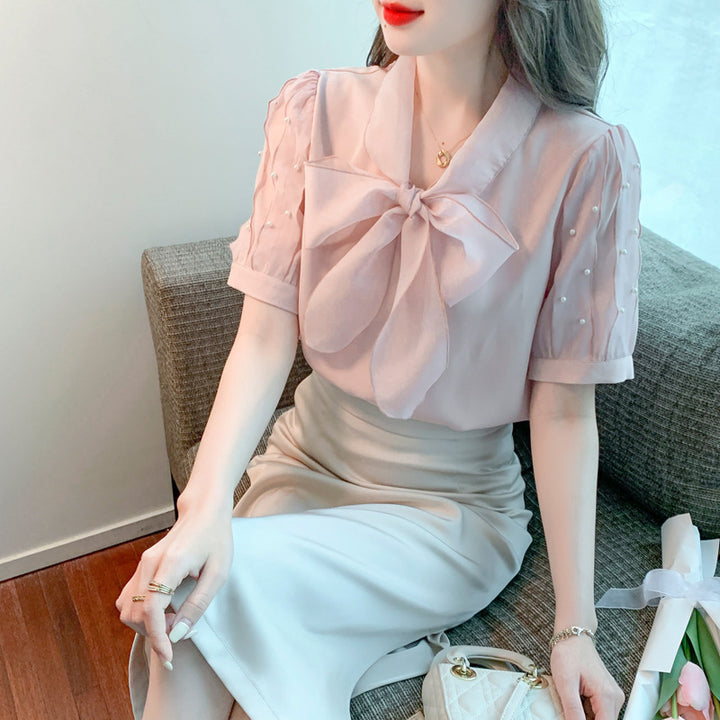 Damen Bluse mit elegantem Schleifen-Ausschnitt und strukturierten Ärmeln Drune