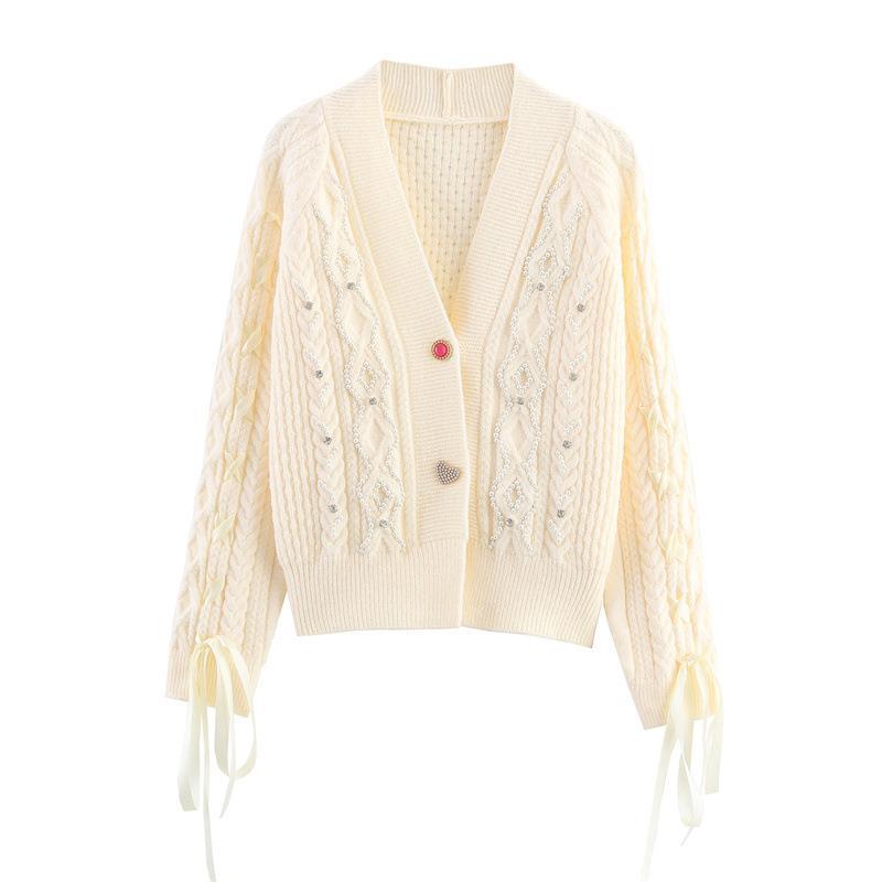 Damen Strickjacke mit detaillierter Zopfmusterung und eleganten Rüschendetails Drune
