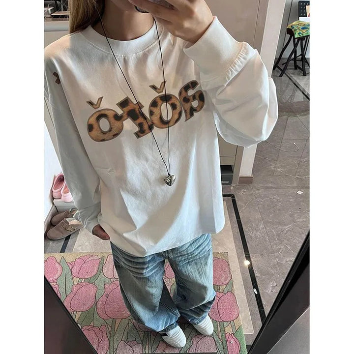 Damen Langarmshirt mit kreativem Grafikdesign Drune