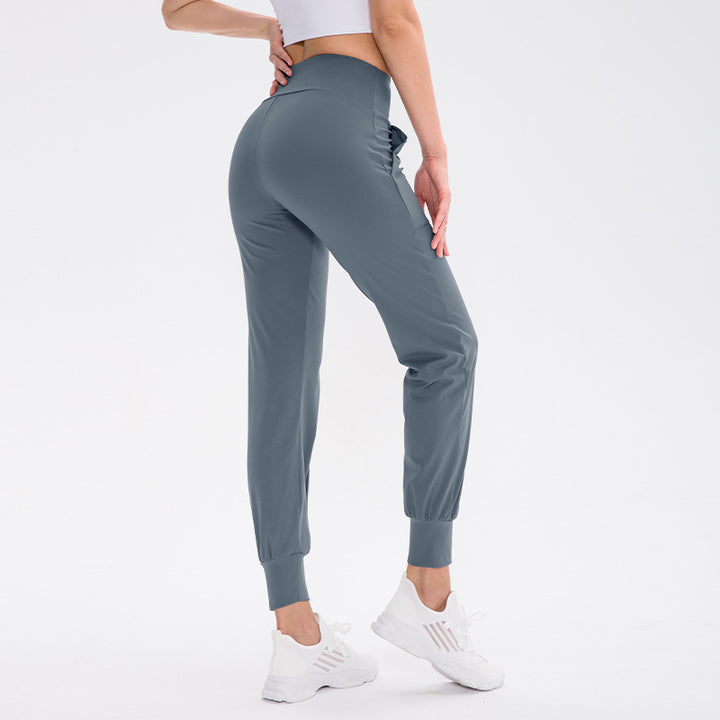 Damen elastische Sporthose mit praktischen Seitentaschen und temperaturregulierendem Material Drune