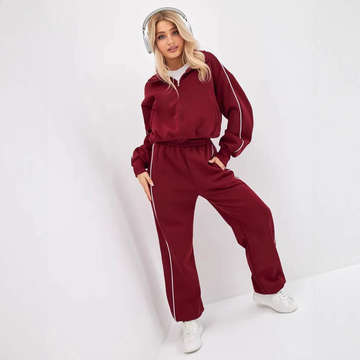 Damen sportliches Freizeit-Set mit hochgeschlossener Jacke und weit geschnittenen Hosen Drune