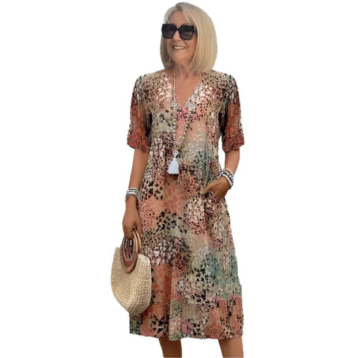 Damen Blumenmuster Midi Kleid mit Taschen Drune